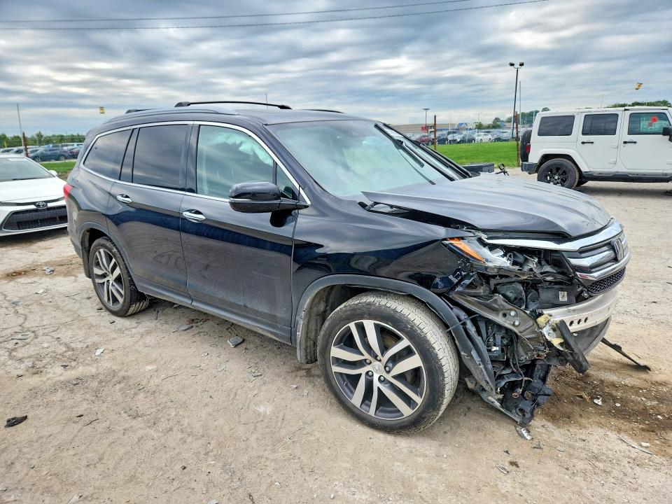 Photo 4 from auction – 2017 HONDA PILOT with VIN 5FNYF6H06HB055820