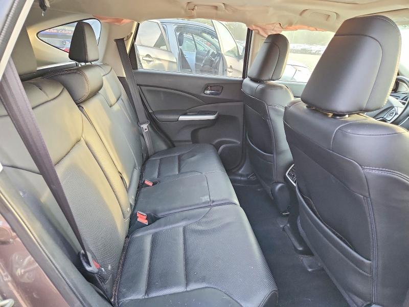 Photo 11 from auction – 2015 HONDA CR-V with VIN 5J6RM4H96FL009700