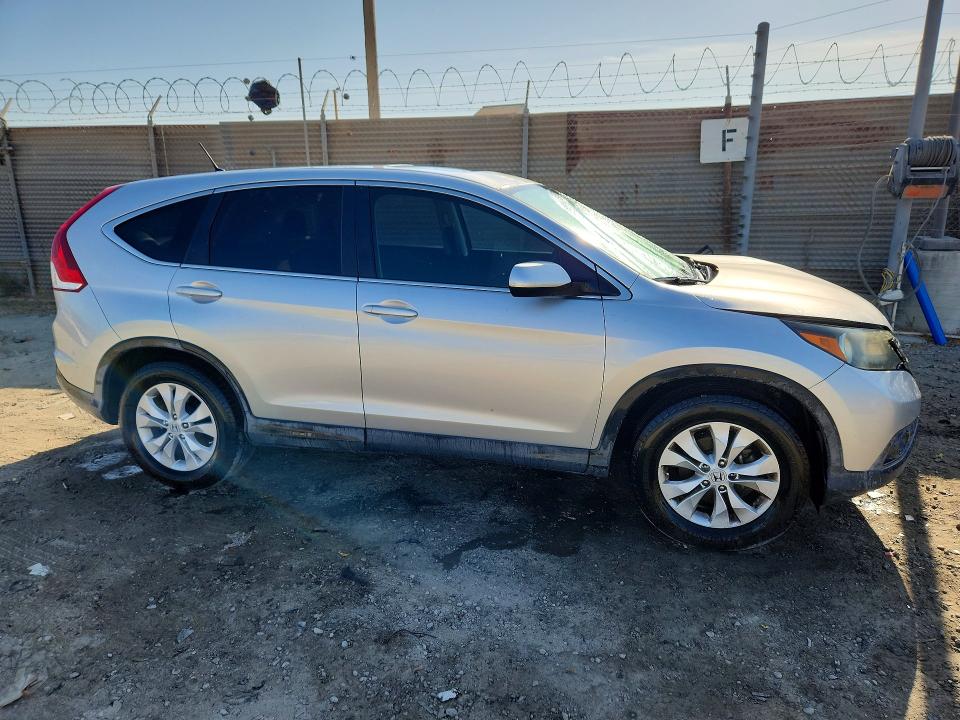 Photo 4 from auction – 2012 HONDA CR-V with VIN JHLRM3H57CC008079