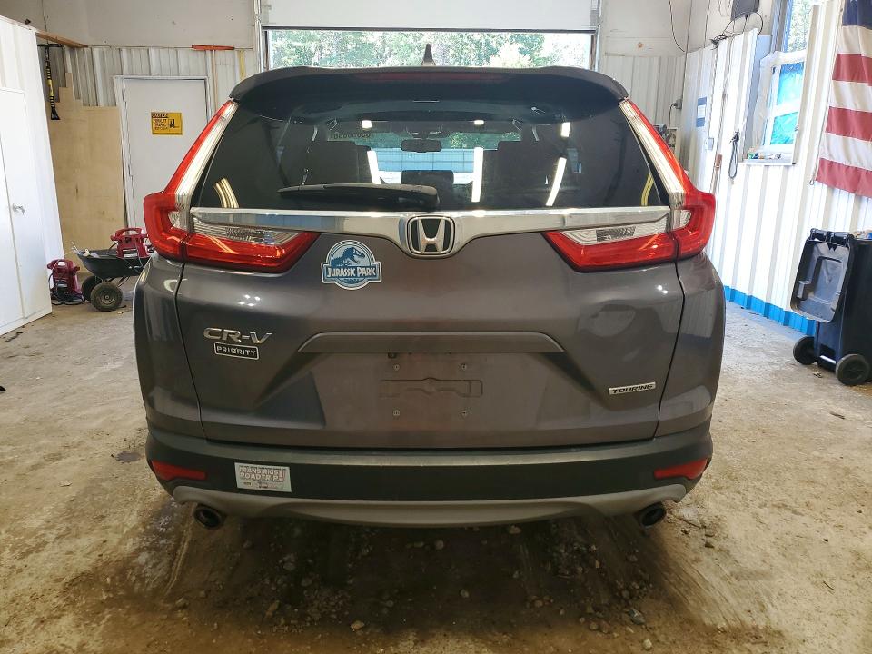 Photo 6 from auction – 2018 HONDA CR-V with VIN 7FARW1H98JE011396