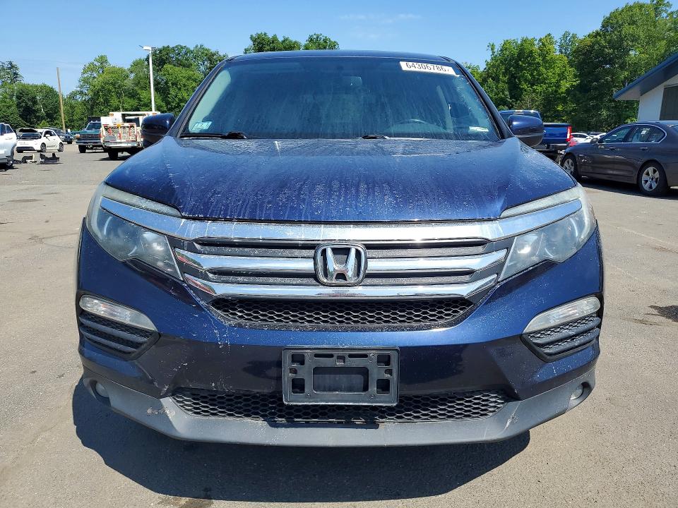 Photo 5 from auction – 2016 HONDA PILOT with VIN 5FNYF6H74GB053950