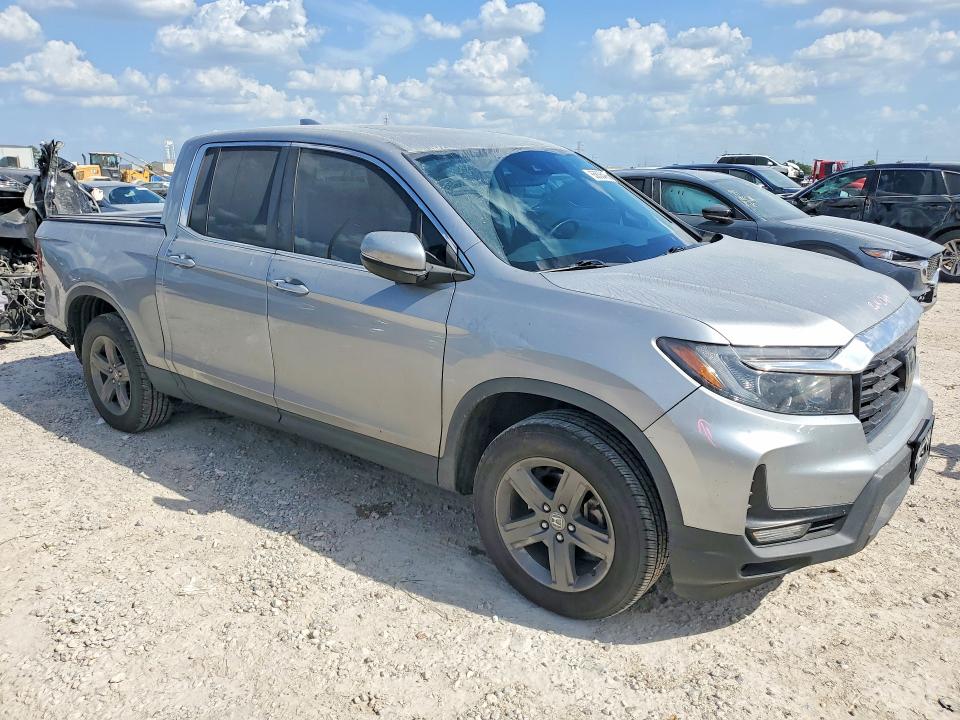 Photo 4 from auction – 2023 HONDA RIDGELINE with VIN 5FPYK3F58PB048253