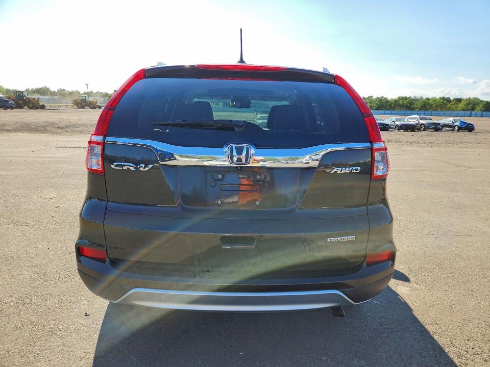 Photo 6 from auction – 2015 HONDA CR-V with VIN 5J6RM4H94FL032764