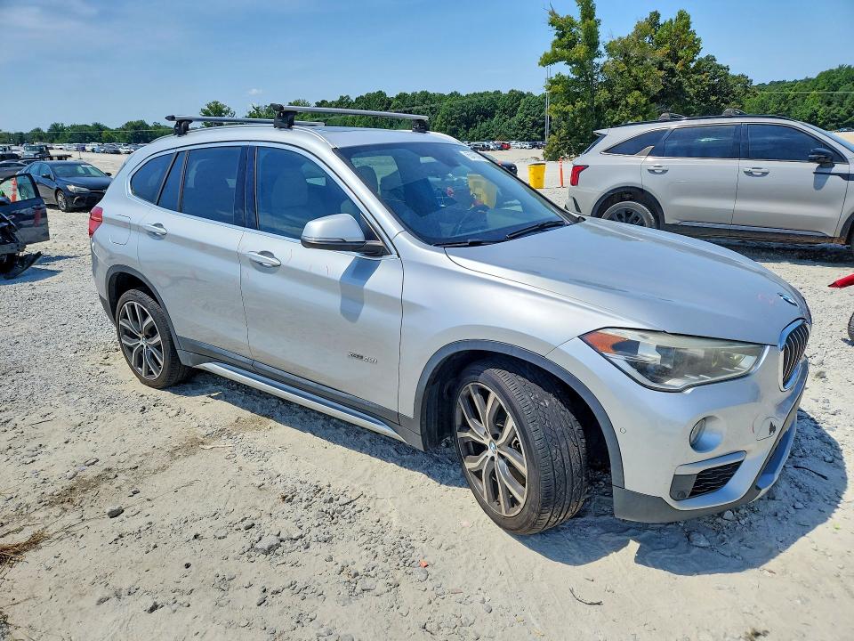 Photo 4 from auction – 2017 BMW X1 with VIN WBXHT3C37H5F71202