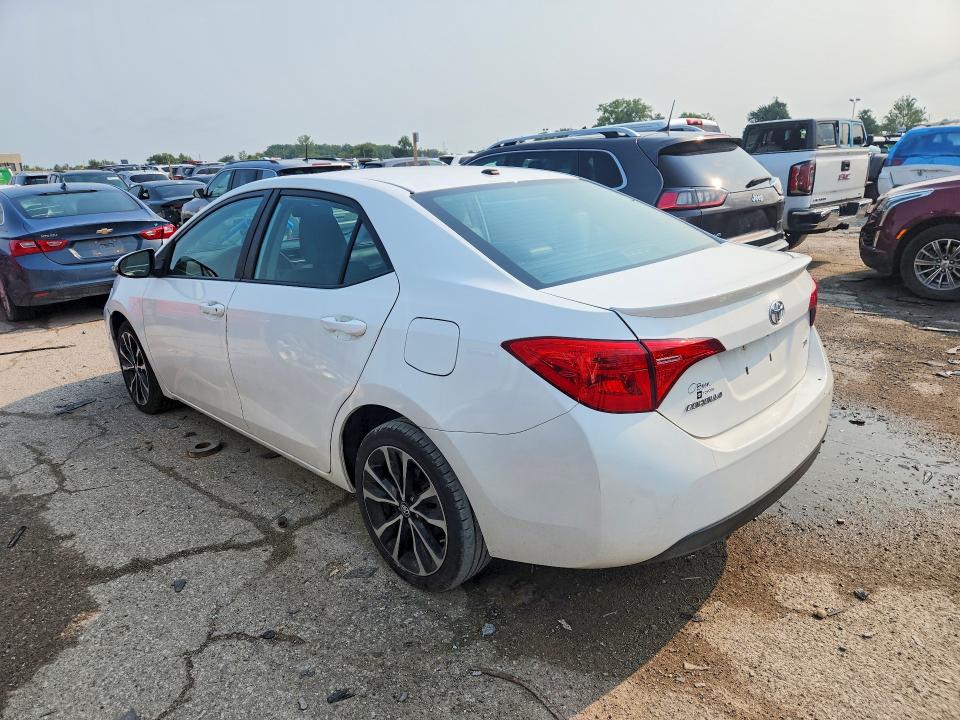 Photo 2 from auction – 2018 TOYOTA COROLLA with VIN 5YFBURHE8JP770018