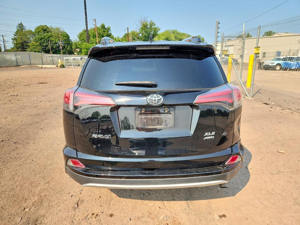 Photo 6 from auction – 2016 TOYOTA RAV4 with VIN 2T3RFREV4GW537068