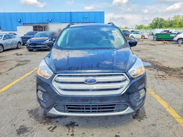 Photo 5 from auction – 2018 FORD ESCAPE with VIN 1FMCU0GD7JUB10253
