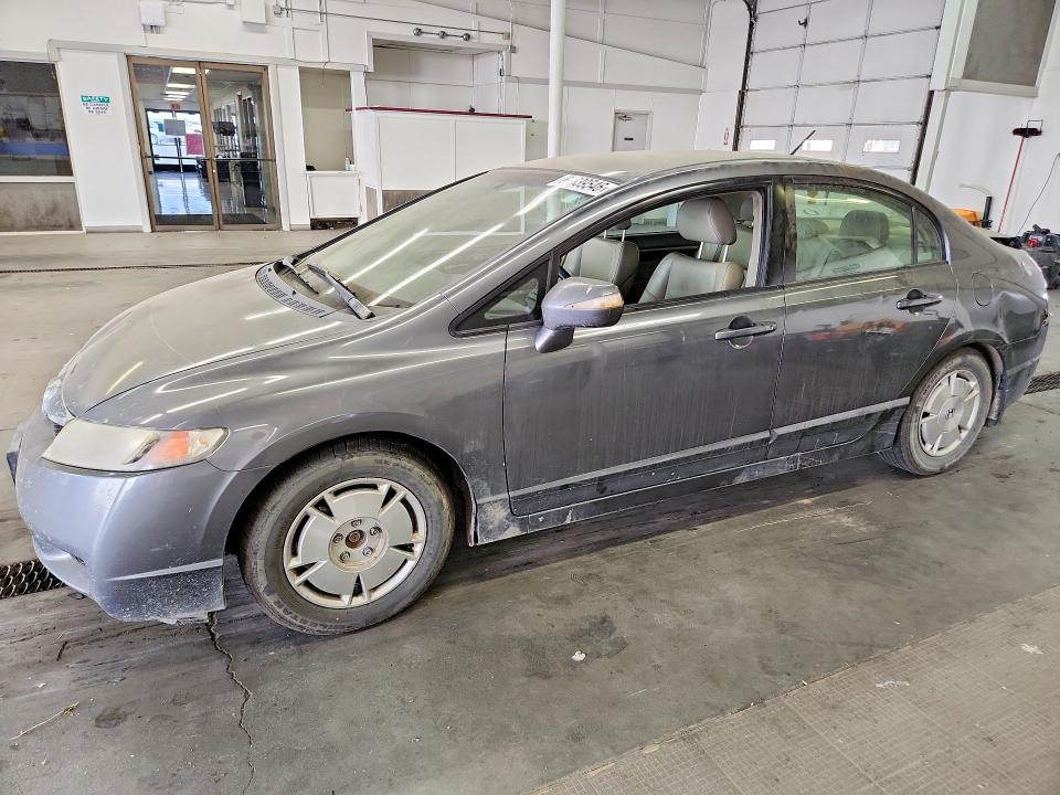 HONDA CIVIC 2010 with VIN JHMFA3F26AS003135 - Photo from auction