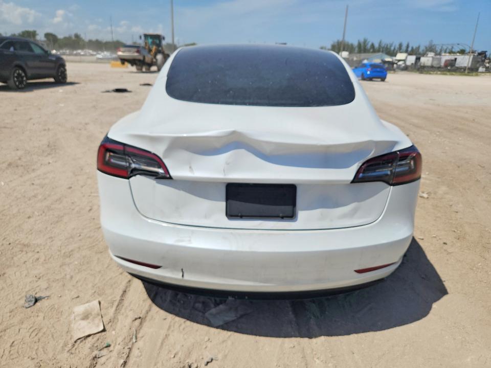 Снимка 6 от търг – 2023 TESLA MODEL 3 с VIN 5YJ3E1EA9PF384698