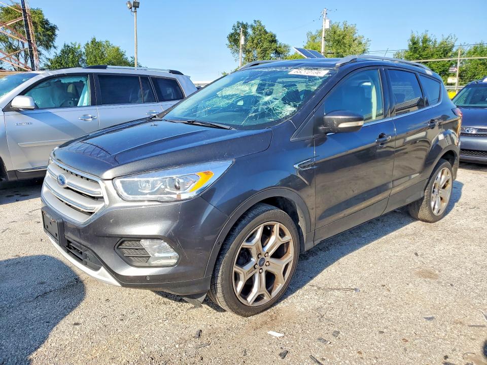 FORD ESCAPE 2019 with VIN 1FMCU9J98KUC37300 - Photo from auction