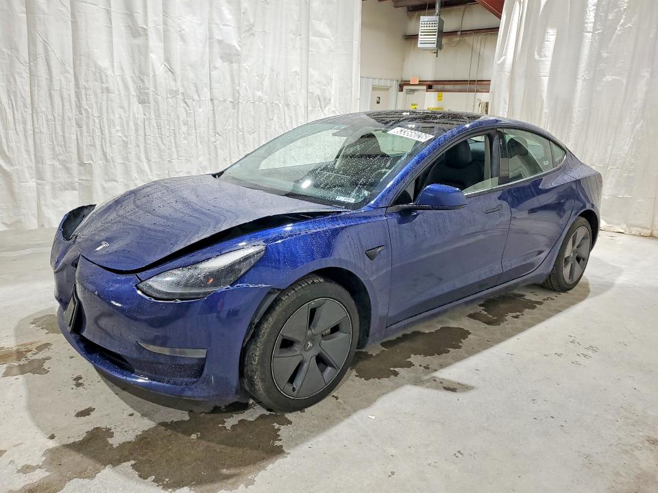 TESLA MODEL 3 2022 with VIN 5YJ3E1EA3NF369773 - Photo from auction