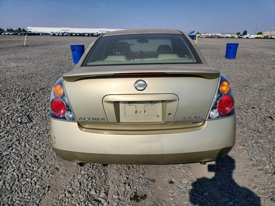 Photo 6 from auction – 2002 NISSAN ALTIMA with VIN 1N4BL11E72C129036