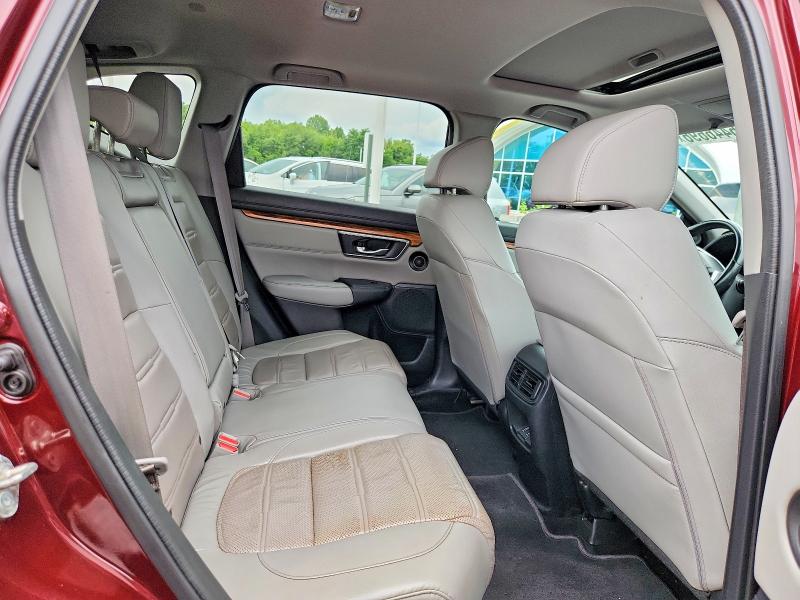 Photo 11 from auction – 2018 HONDA CR-V with VIN 7FARW2H83JE033349