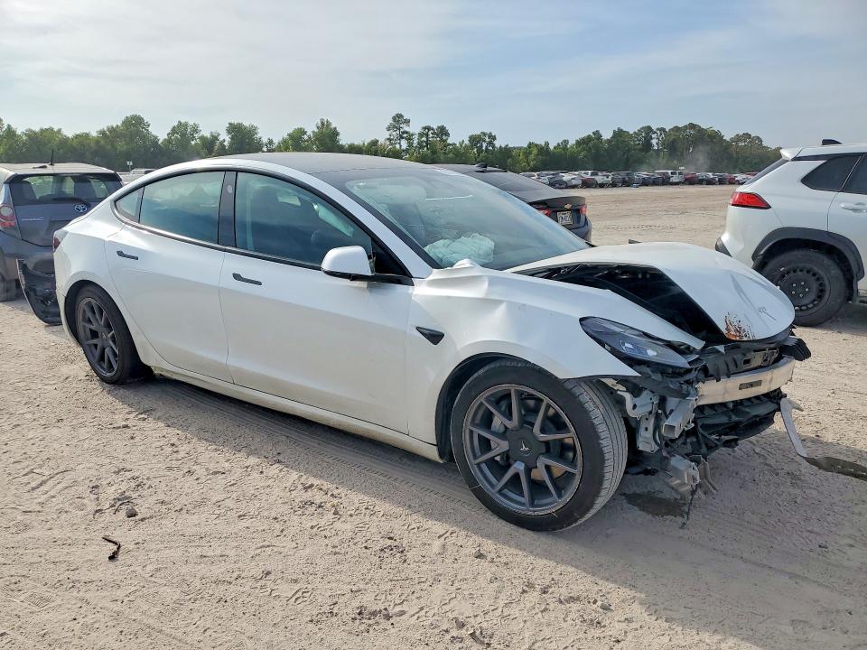Photo 4 from auction – 2023 TESLA MODEL 3 with VIN 5YJ3E1EA5PF424503