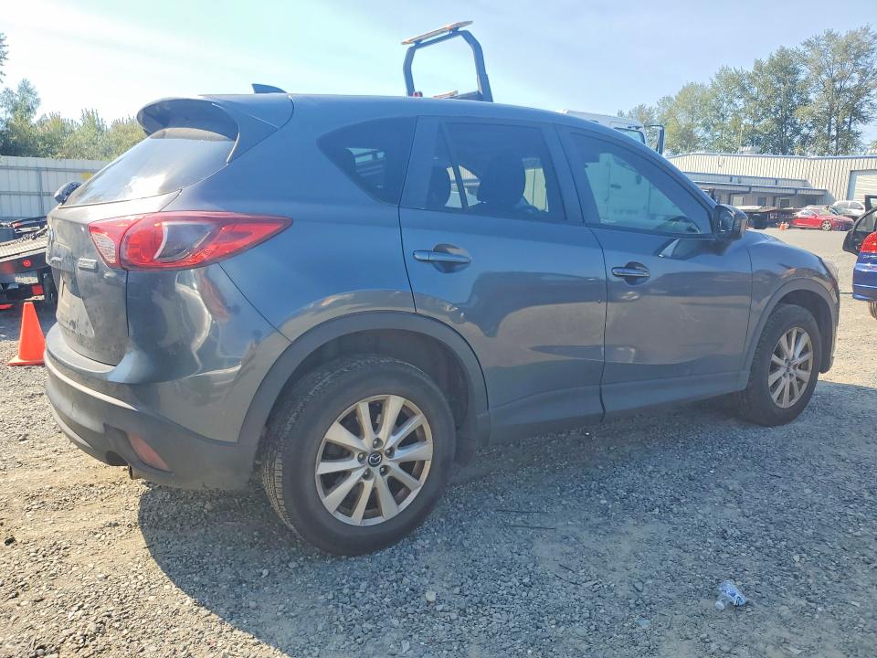 Photo 3 from auction – 2013 MAZDA CX-5 with VIN JM3KE2CE8D0150495