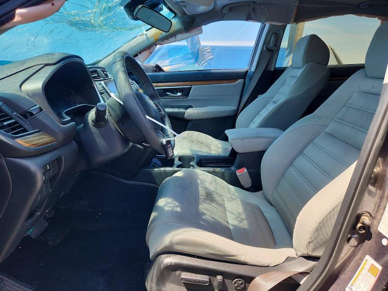Photo 7 from auction – 2018 HONDA CR-V with VIN 7FARW1H55JE017069
