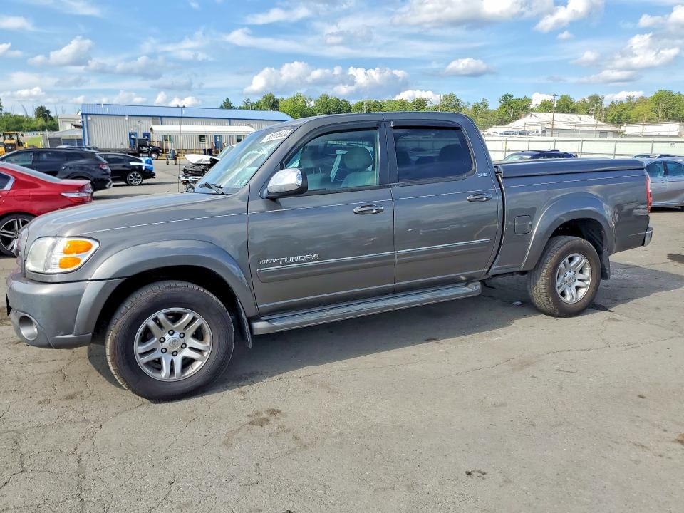 TOYOTA TUNDRA 2004 with VIN 5TBDT44144S440169 - Photo from auction
