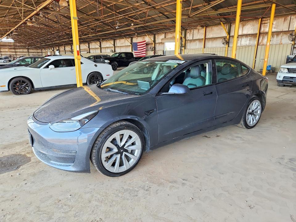 TESLA MODEL 3 2022 with VIN 5YJ3E1EA8NF369347 - Photo from auction