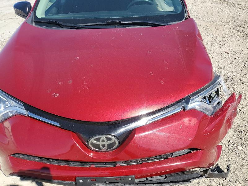 Photo 11 from auction – 2018 TOYOTA RAV4 with VIN 2T3BFREV5JW707060