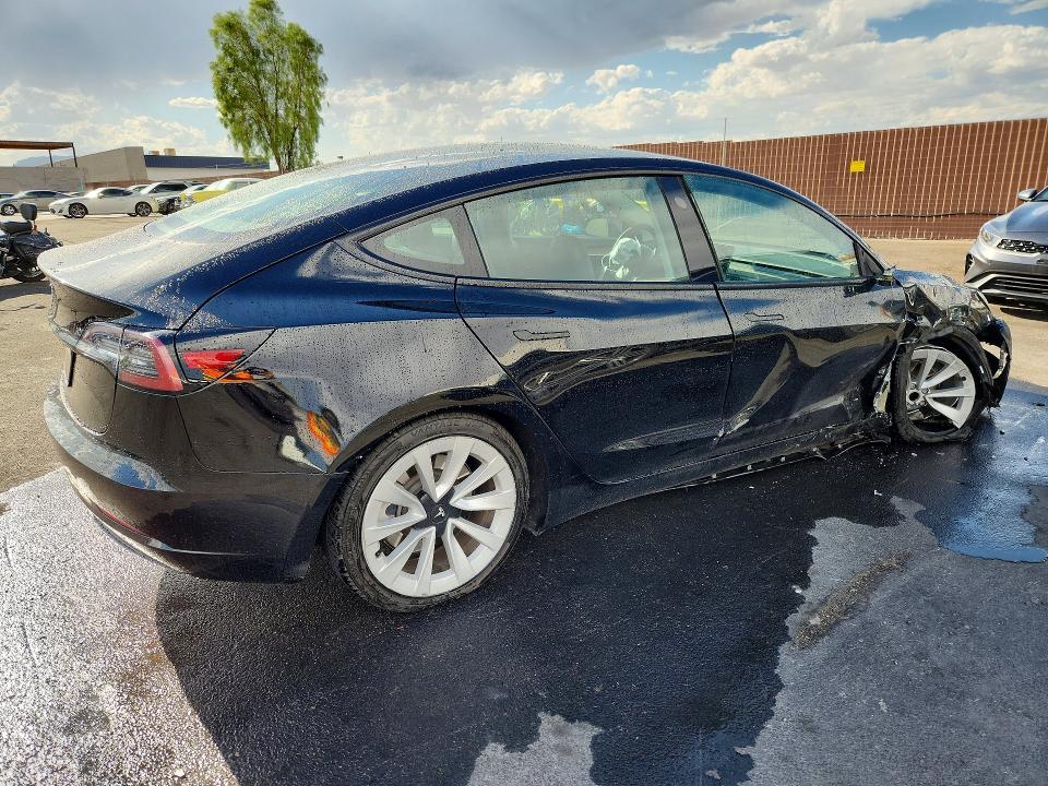 Photo 3 from auction – 2023 TESLA MODEL 3 with VIN 5YJ3E1EA5PF449854
