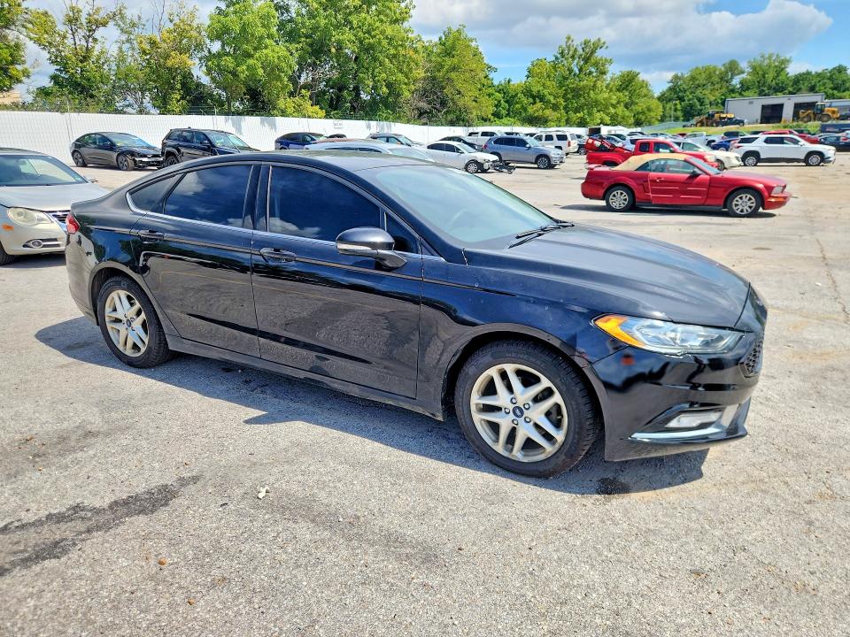 Photo 4 from auction – 2016 FORD FUSION with VIN 3FA6P0H77GR133409