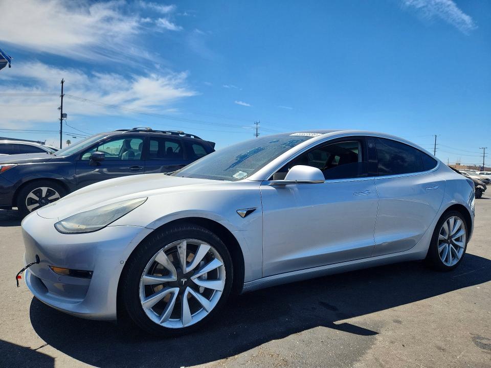 TESLA MODEL 3 2018 with VIN 5YJ3E1EA0JF050132 - Photo from auction