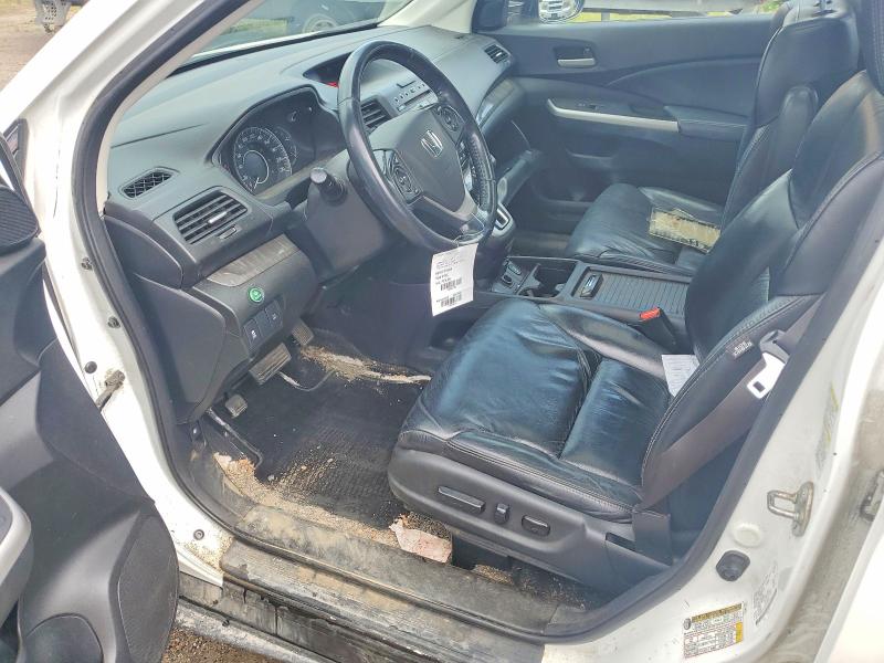 Photo 7 from auction – 2014 HONDA CR-V with VIN 2HKRM4H73EH102679
