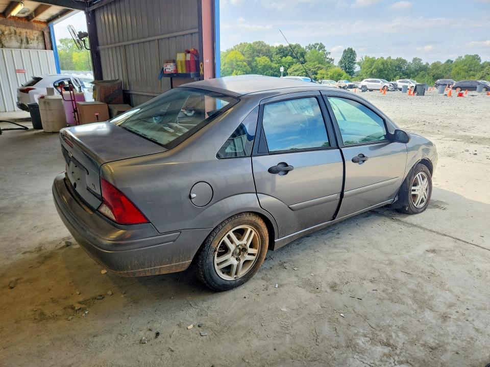Photo 3 from auction – 2003 FORD FOCUS with VIN 1FAFP34313W326019