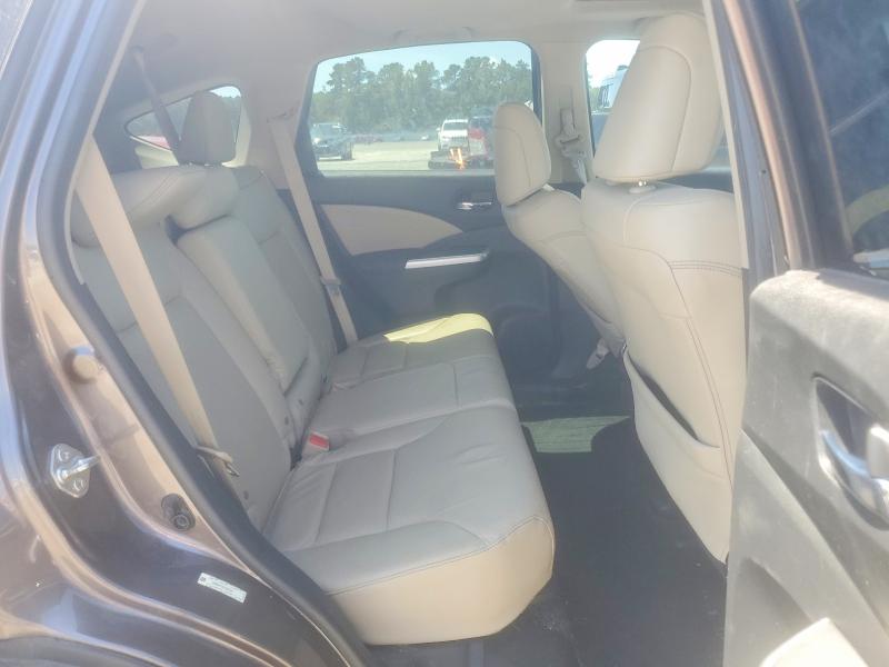 Photo 11 from auction – 2015 HONDA CR-V with VIN 2HKRM4H72FH665305