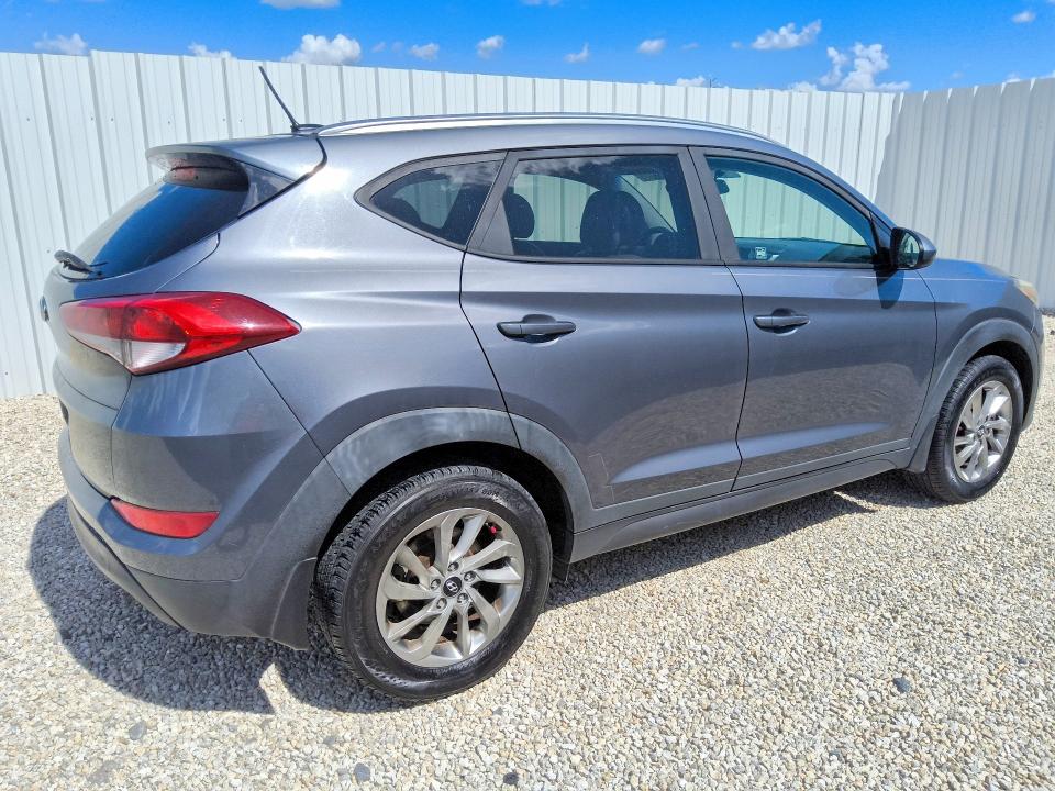 Photo 3 from auction – 2016 HYUNDAI TUCSON with VIN KM8J33A49GU181581