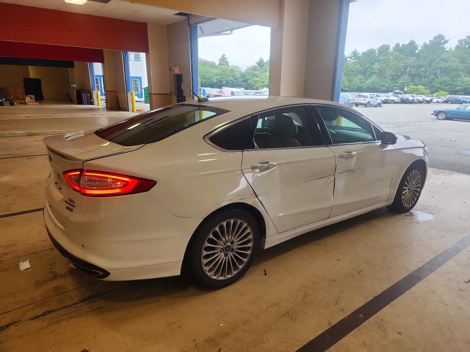 Photo 3 from auction – 2016 FORD FUSION with VIN 3FA6P0K97GR400252
