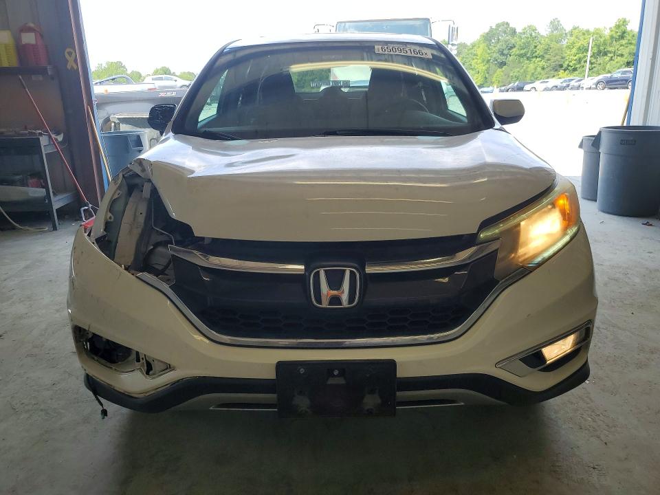 Photo 5 from auction – 2015 HONDA CR-V with VIN 5J6RM3H54FL009282