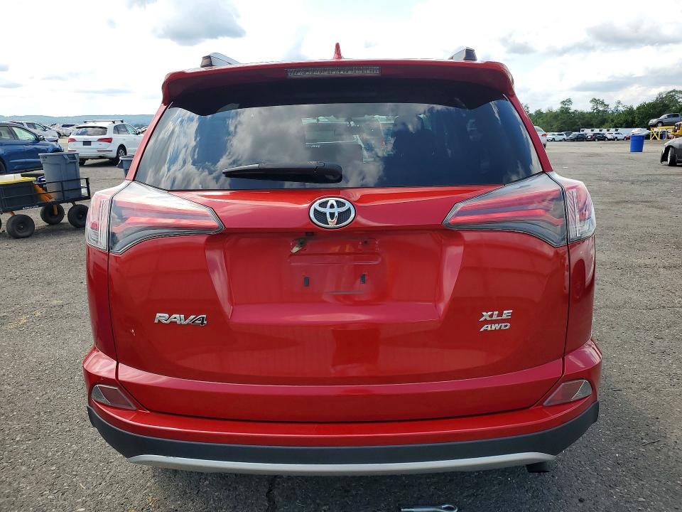Photo 6 from auction – 2016 TOYOTA RAV4 with VIN JTMRFREV0GJ054465