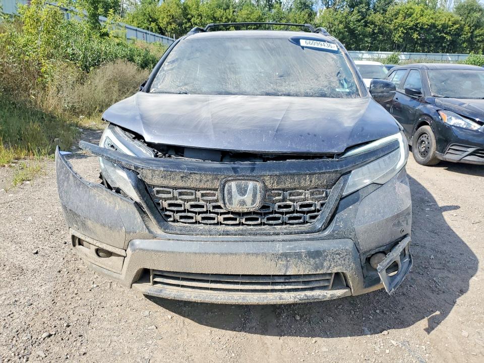 Photo 5 from auction – 2021 HONDA PASSPORT with VIN 5FNYF8H01MB030099