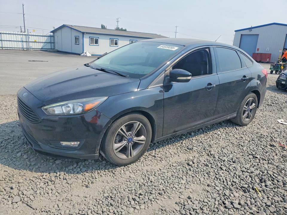 FORD FOCUS 2017 with VIN 1FADP3FE9HL334951 - Photo from auction