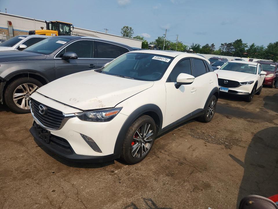 MAZDA CX-3 2018 with VIN JM1DKFC78J0311989 - Photo from auction