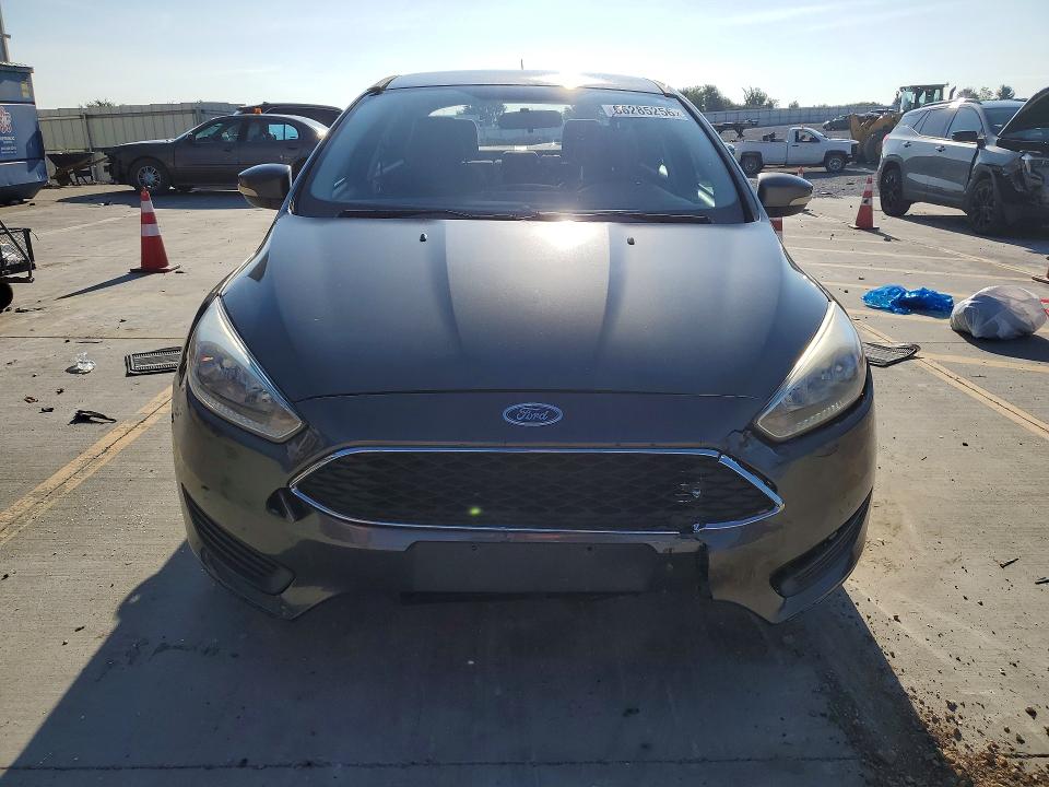Photo 5 from auction – 2016 FORD FOCUS with VIN 1FADP3F27GL280635