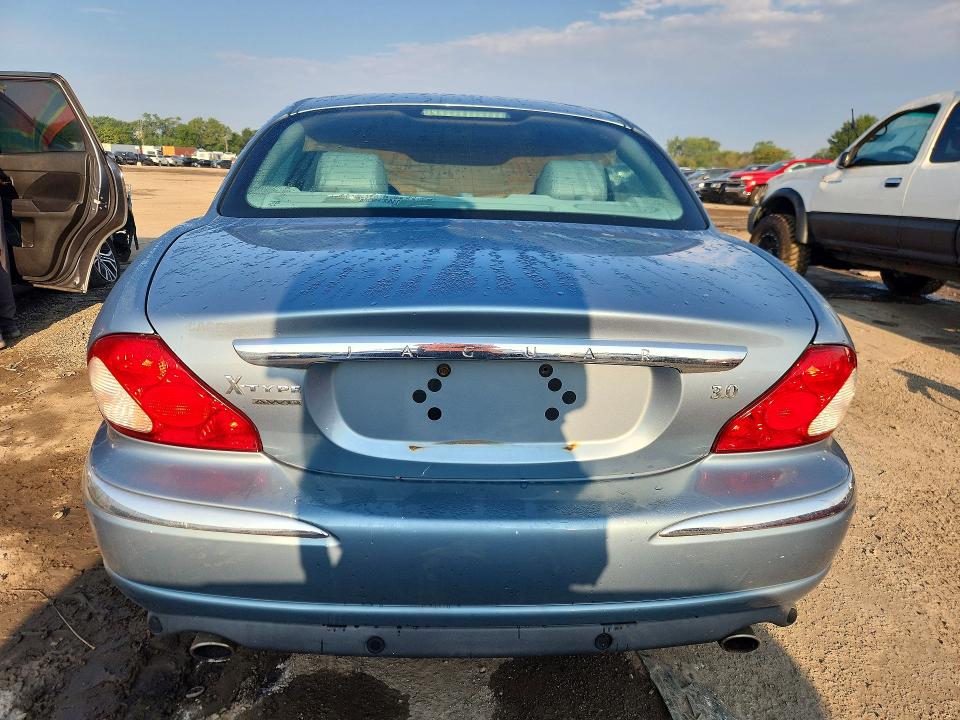Photo 6 from auction – 2004 JAGUAR X-TYPE with VIN SAJEA51C24WD95363