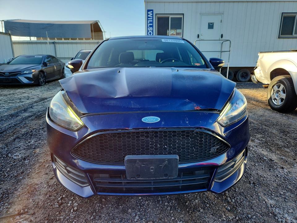 Photo 5 from auction – 2017 FORD FOCUS with VIN 1FADP3L90HL319665