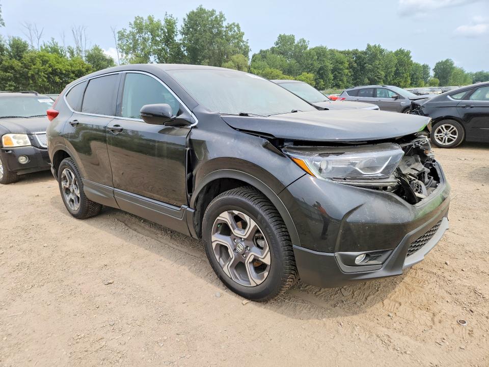 Photo 4 from auction – 2018 HONDA CR-V with VIN 7FARW2H54JE102510