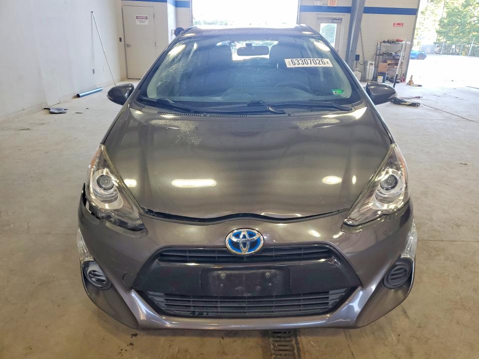 Photo 5 from auction – 2015 TOYOTA PRIUS C with VIN JTDKDTB39F1110182