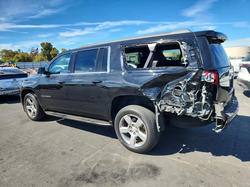 Photo 2 from auction – 2020 CHEVROLET SUBURBAN with VIN 1GNSCHKCXLR160867