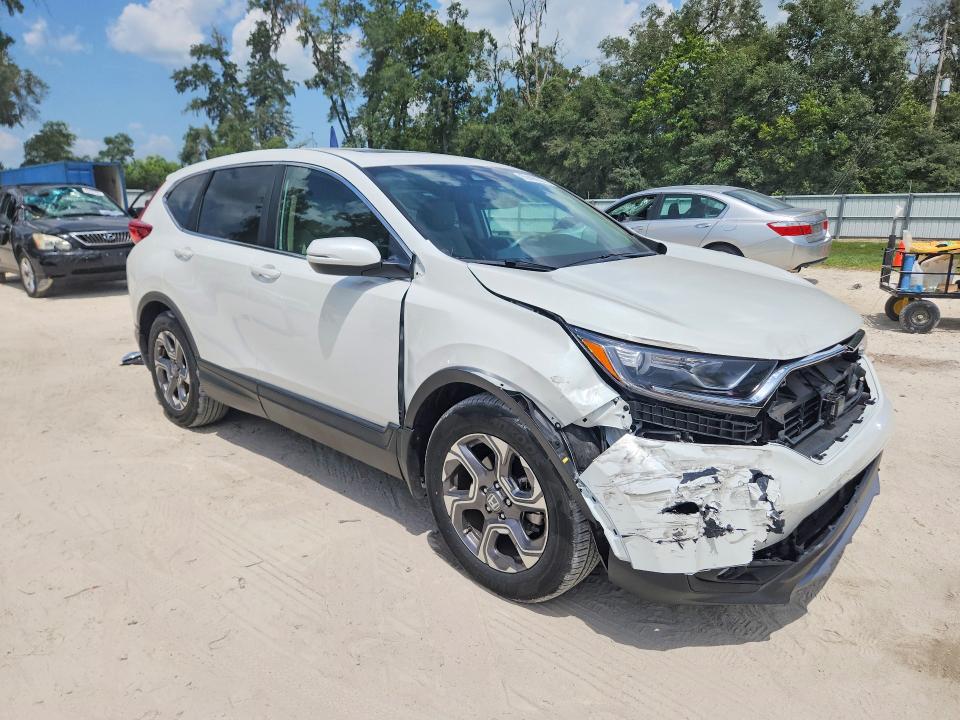 Photo 4 from auction – 2019 HONDA CR-V with VIN 7FARW1H84KE023277