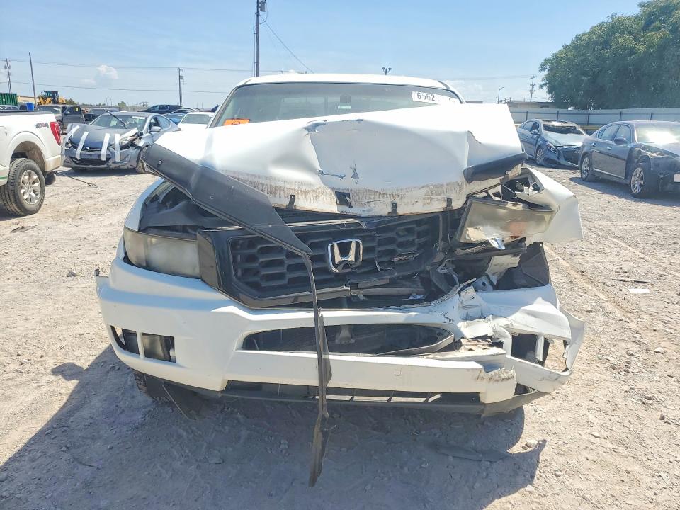 Photo 5 from auction – 2012 HONDA RIDGELINE with VIN 5FPYK1F78CB455019