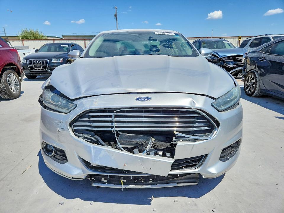 Photo 5 from auction – 2016 FORD FUSION with VIN 3FA6P0K96GR218204
