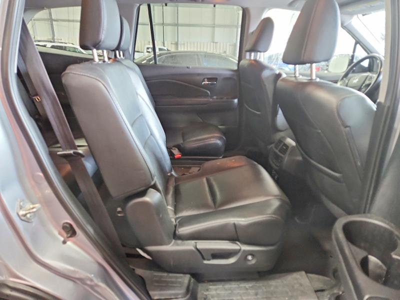 Photo 11 from auction – 2018 HONDA PILOT with VIN 5FNYF6H04JB007299