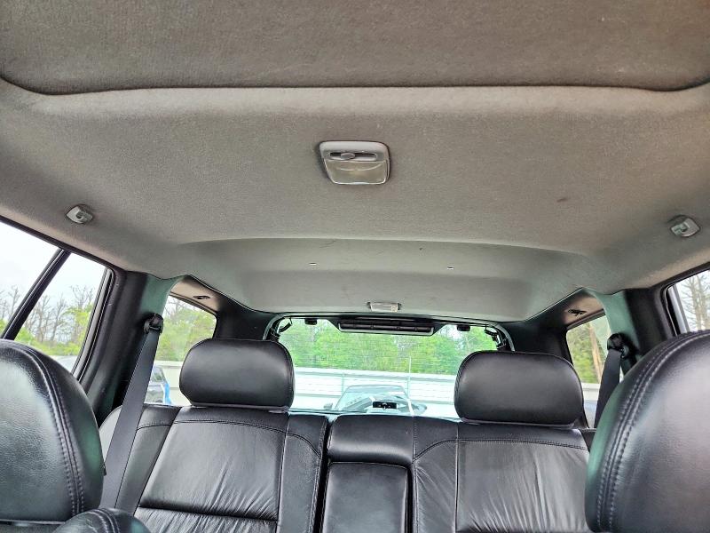 Photo 10 from auction – 2003 INFINITI QX4 with VIN JNRDR09Y13W300812
