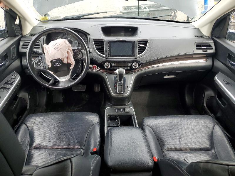 Photo 8 from auction – 2015 HONDA CR-V with VIN 5J6RM4H94FL096660
