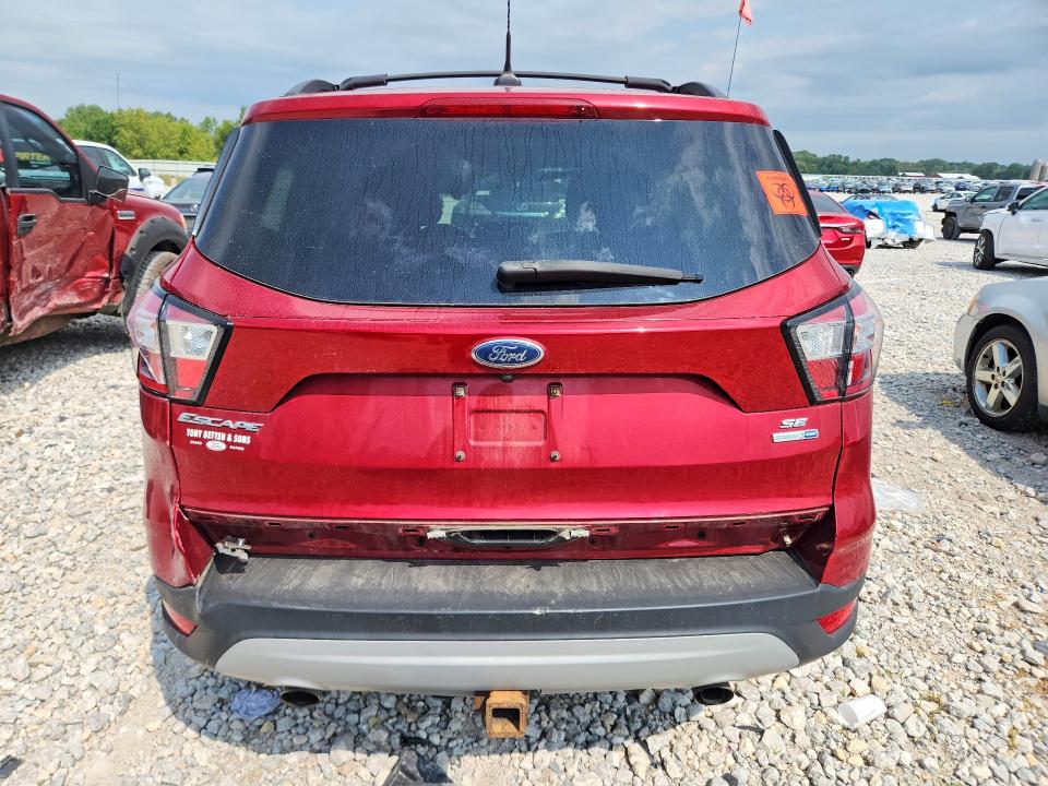 Photo 6 from auction – 2018 FORD ESCAPE with VIN 1FMCU9GD5JUD18992