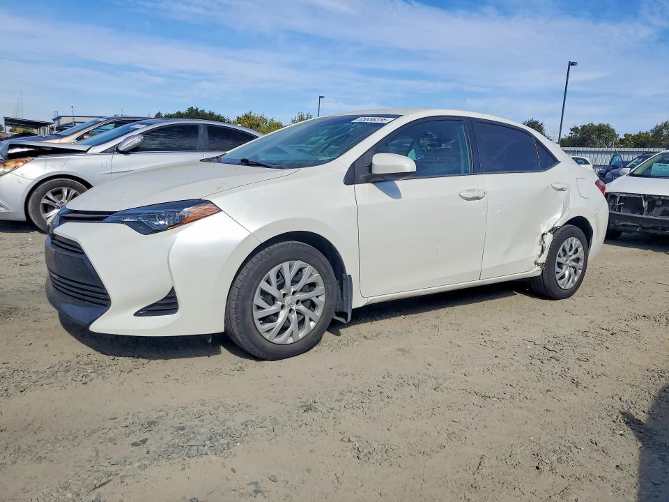 TOYOTA COROLLA 2018 with VIN 5YFBURHEXJP797544 - Photo from auction
